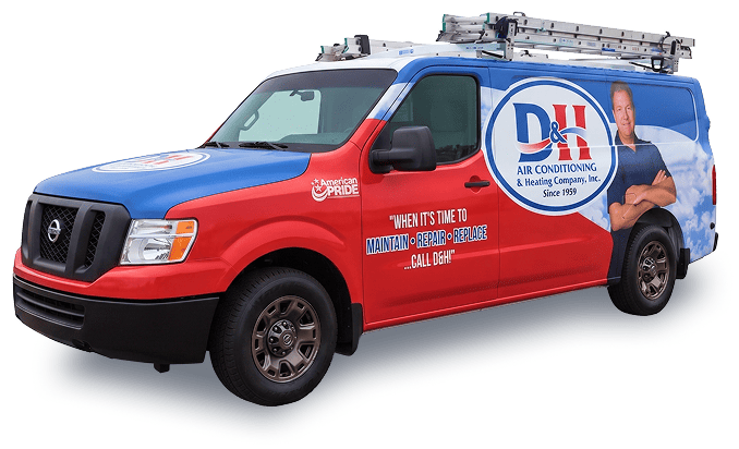 D&H Air Conditioning & Heating service van in blue and red with a ladder rack and company logo
